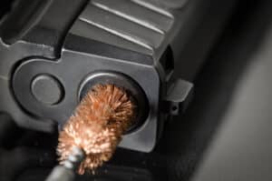 Image of a pistol being cleaned