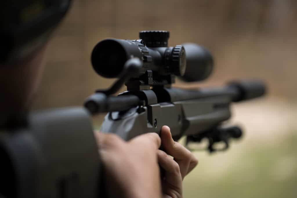 image of a scoped in rifle